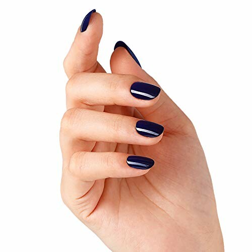 Hand with dark blue nail polish.